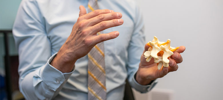 Dr. Bomberg talking to a client.