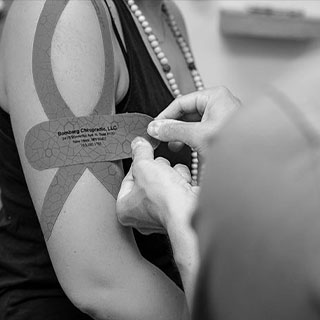 Close up shot of a Kinesio Taping application